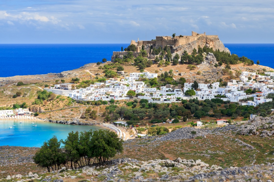 'View from the road down to the popular town of Lindos on the Island of Rhodes Greece' - Rhodos